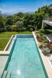 a view of a yard with a patio