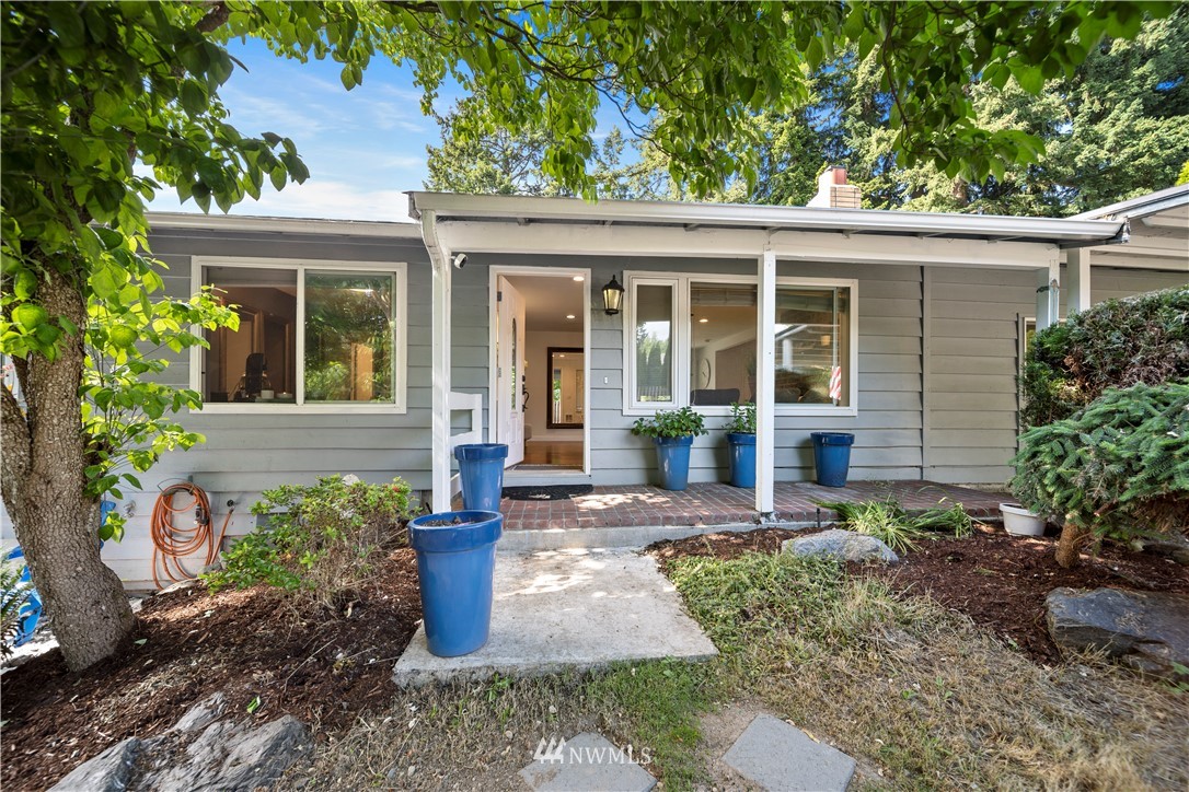 2915 193rd Place Southeast Bothell, WA 98012 - Photo 1 of 17 a view of a house with potted plants