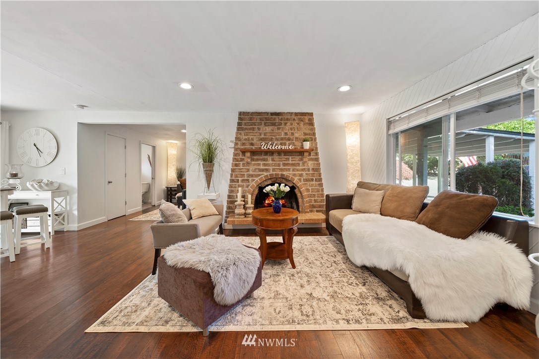 2915 193rd Place Southeast Bothell, WA 98012 - Photo 3 of 17 a living room with furniture and a large window