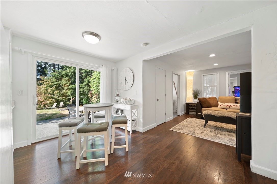 2915 193rd Place Southeast Bothell, WA 98012 - Photo 5 of 17 a living room with furniture and a large window