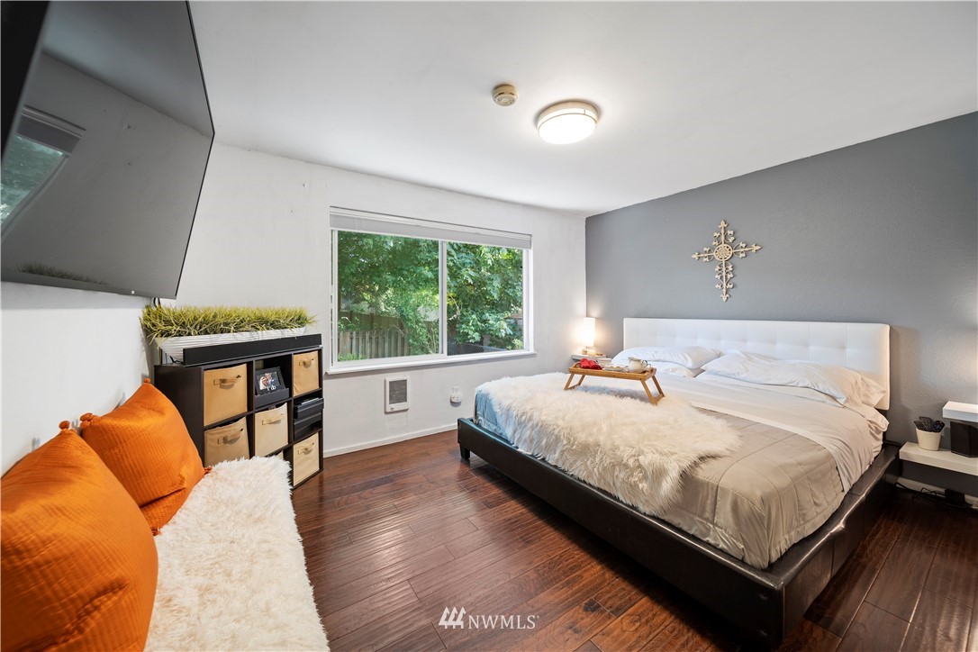 2915 193rd Place Southeast Bothell, WA 98012 - Photo 10 of 17 a bedroom with a bed and a window