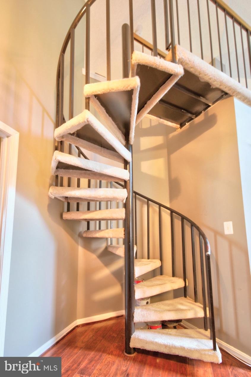 1019 Fallcrest Court, Unit 302 Bowie, MD 20721 - Photo 22 of 34 Spiral stairway to your heavenly loft
