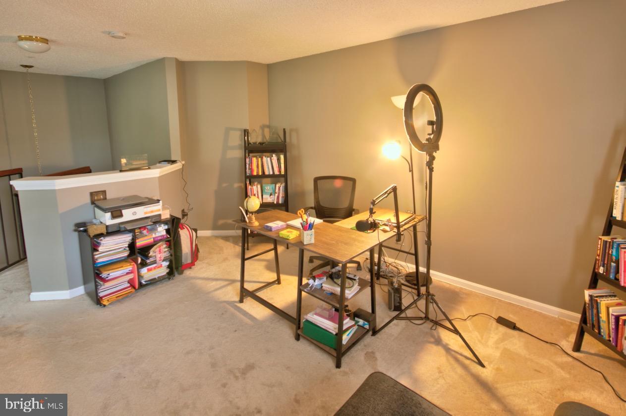 1019 Fallcrest Court, Unit 302 Bowie, MD 20721 - Photo 24 of 34 lounge/yoga//office space in loft area