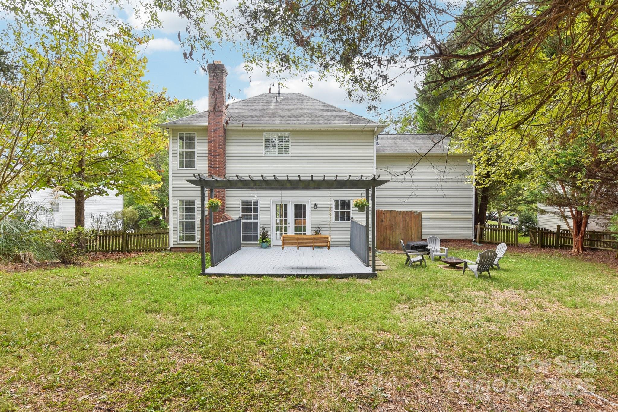 8700 Barrister Way Charlotte, NC 28216 - Photo 25 of 25 a front view of house with yard and seating area