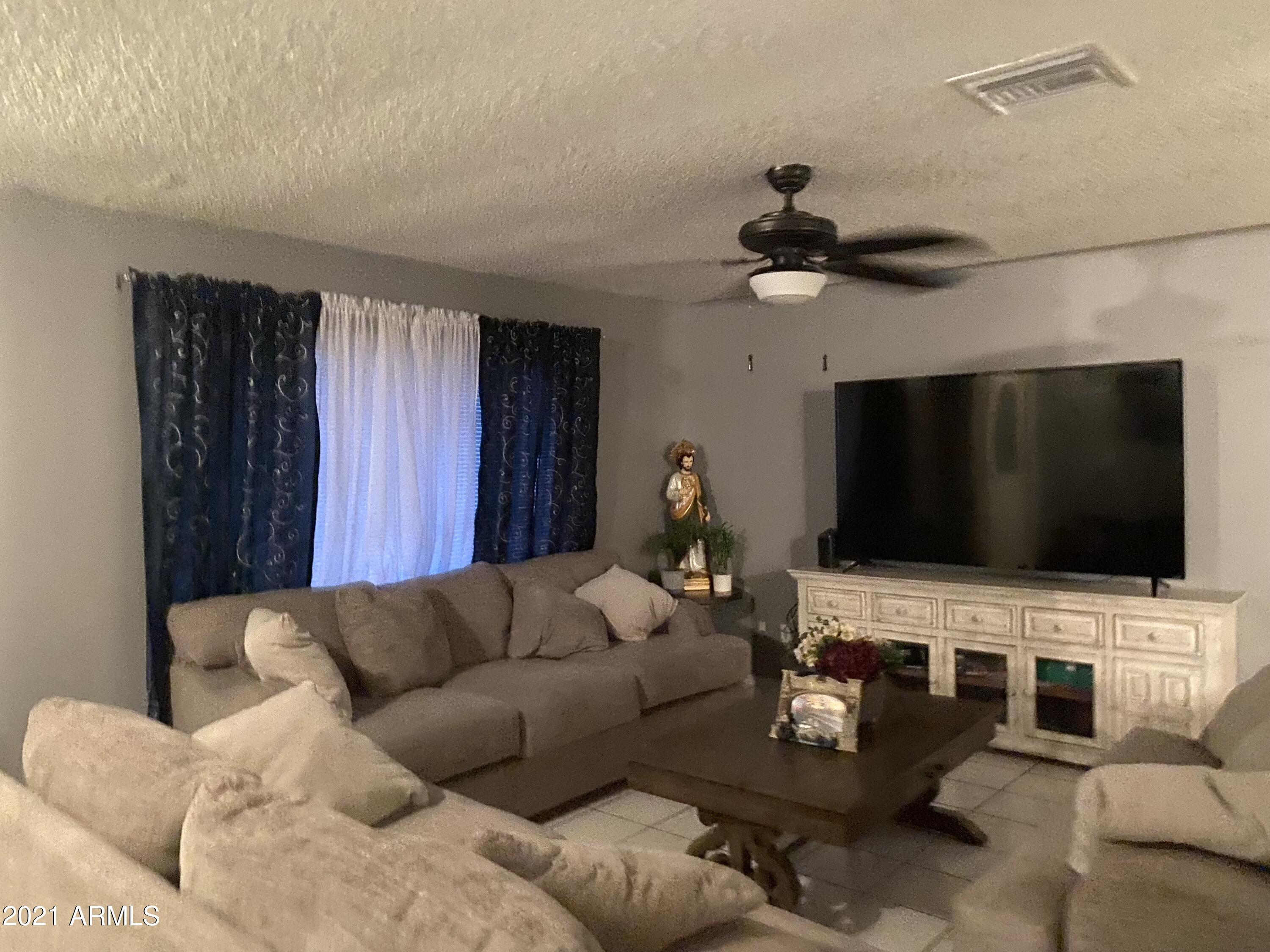 7215 West Merrell Street Phoenix, AZ 85033 - Photo 3 of 25 7215 W Merrell St 5