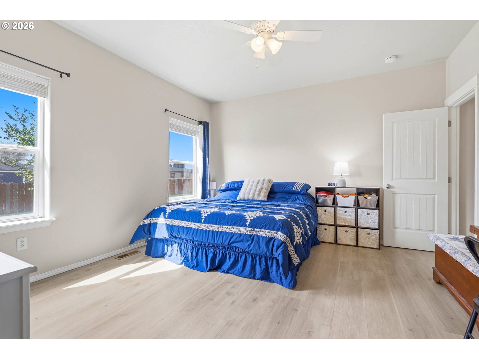 213 Sandy Court Boardman, OR 97818 - Photo 20 of 39 a bedroom with a bed and a large window