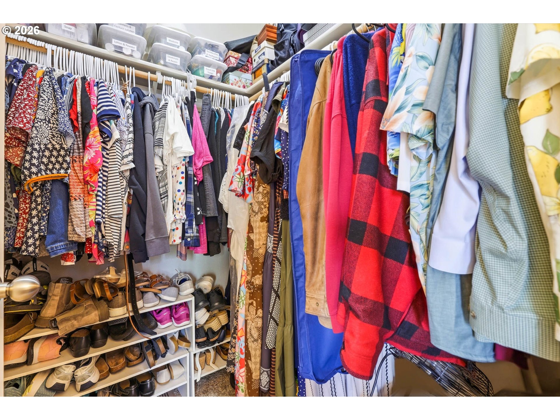 213 Sandy Court Boardman, OR 97818 - Photo 21 of 39 a view of walk in closet with clothes