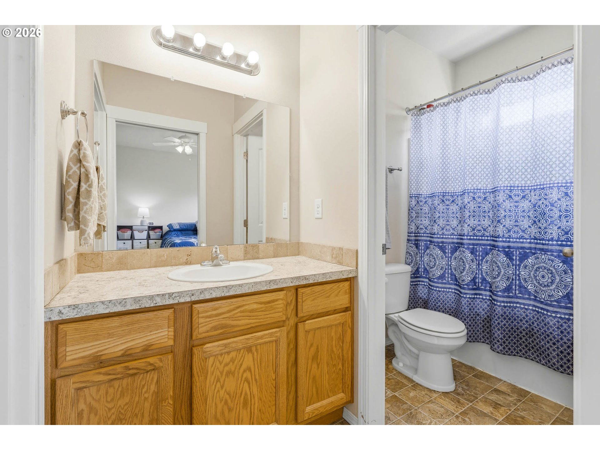213 Sandy Court Boardman, OR 97818 - Photo 25 of 39 a bathroom with a granite countertop sink toilet and shower
