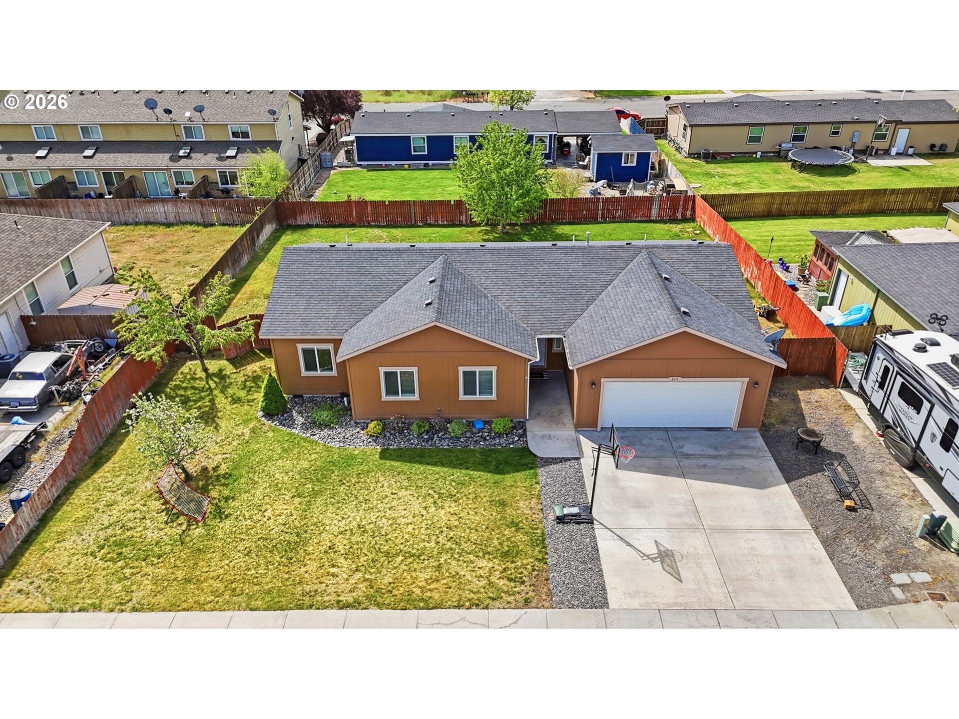 213 Sandy Court Boardman, OR 97818 - Photo 31 of 39 an aerial view of a house with a big yard