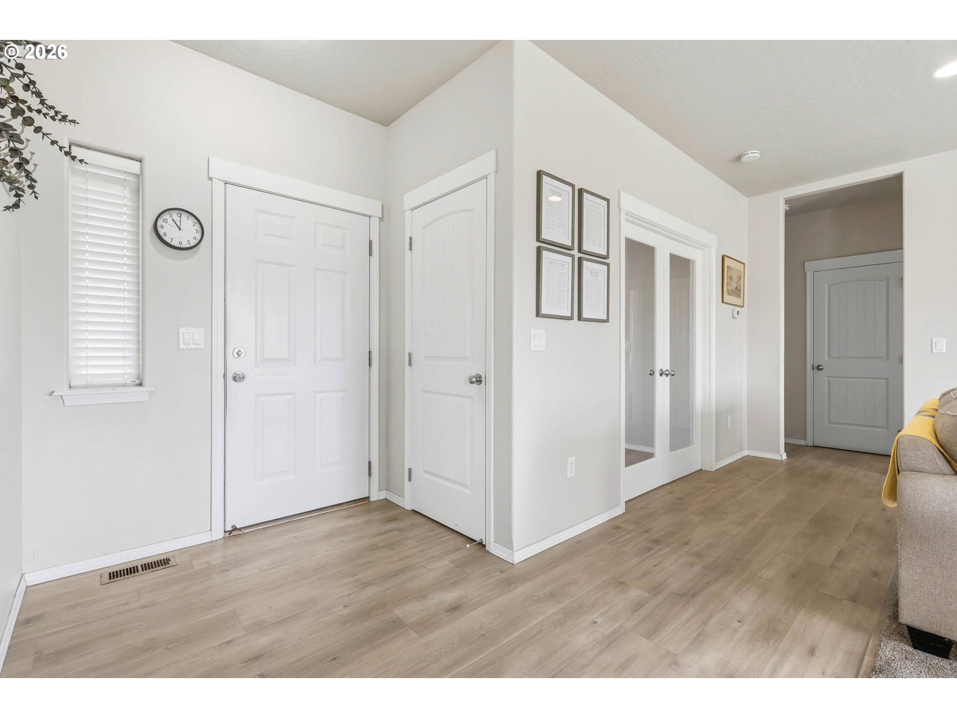 213 Sandy Court Boardman, OR 97818 - Photo 4 of 39 a view of an empty room with window and hallway