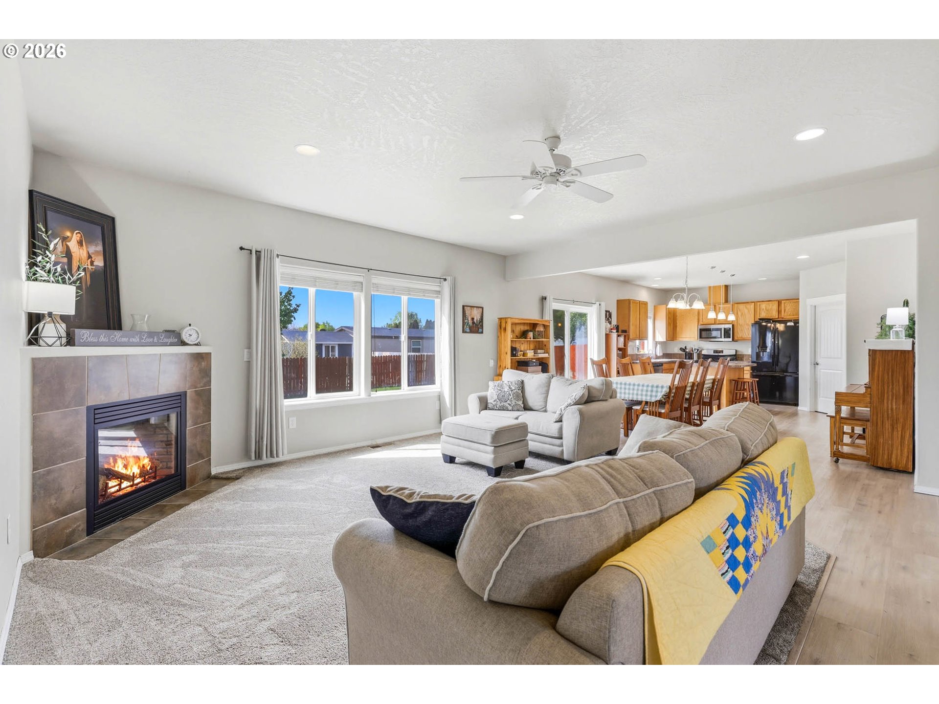 213 Sandy Court Boardman, OR 97818 - Photo 6 of 39 a living room with furniture and a fireplace