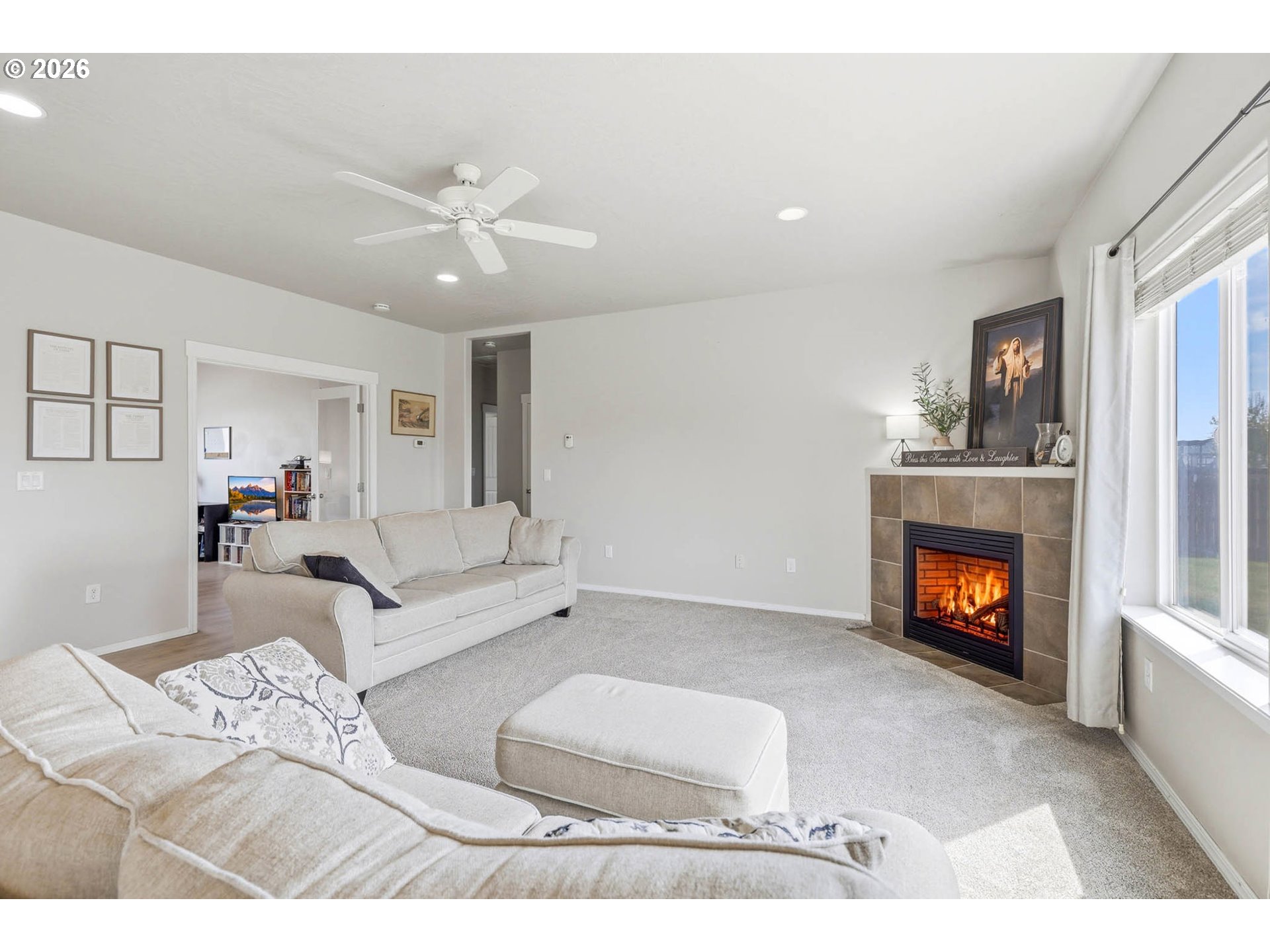 213 Sandy Court Boardman, OR 97818 - Photo 7 of 39 a living room with furniture and a fireplace