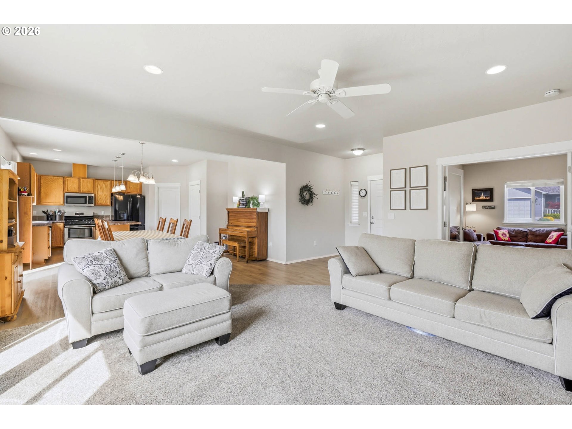 213 Sandy Court Boardman, OR 97818 - Photo 8 of 39 a living room with furniture and a view of kitchen
