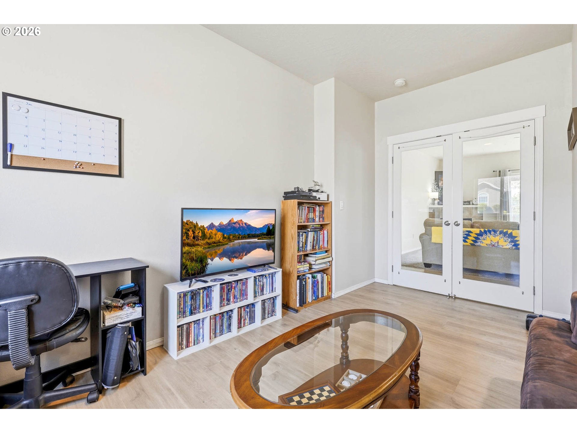 213 Sandy Court Boardman, OR 97818 - Photo 9 of 39 a living room with furniture a rug and a flat screen tv