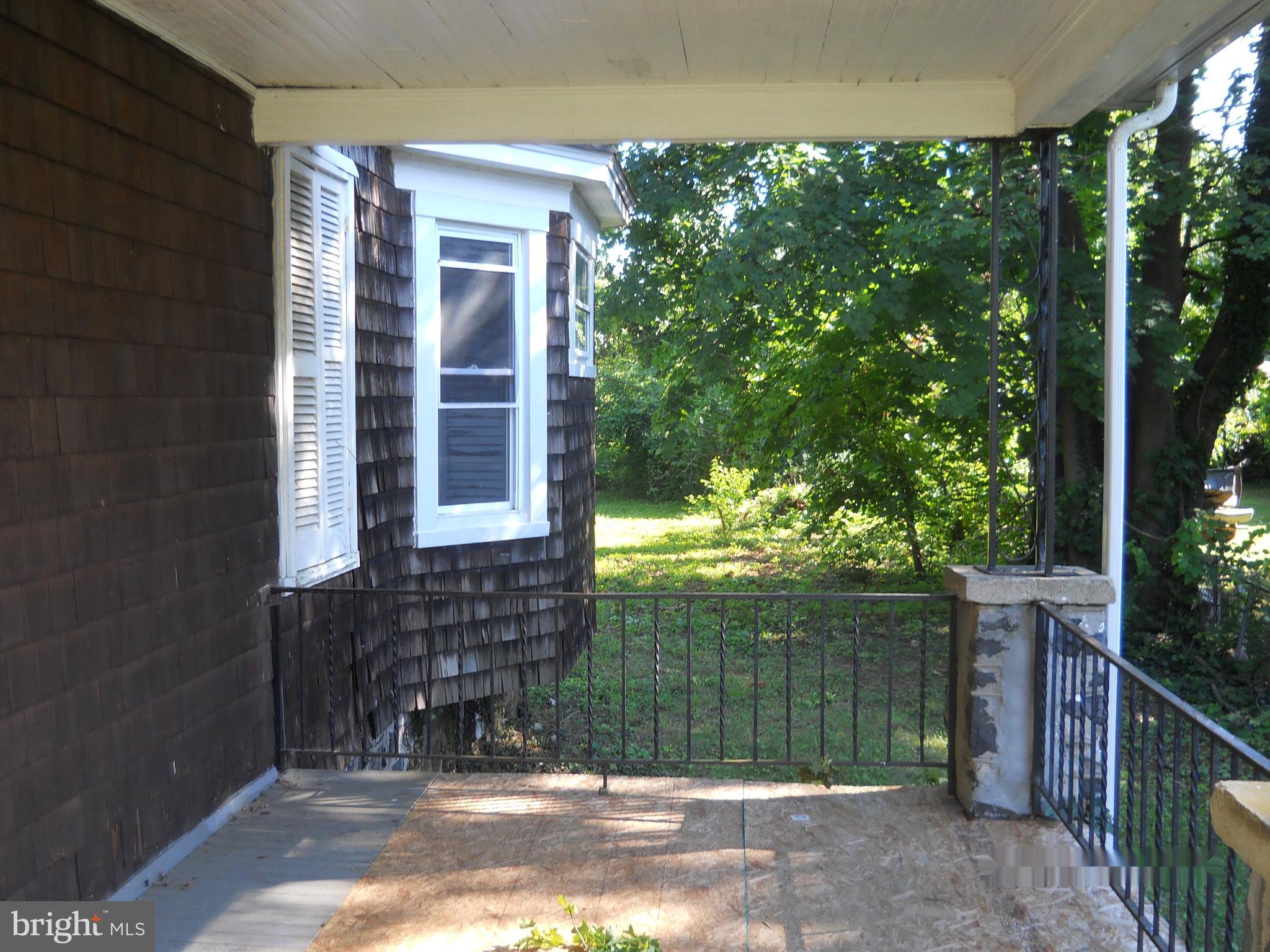3709 Chatham Road Baltimore, MD 21215 - Photo 2 of 19 Side of front porch