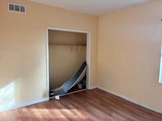 4100 Howard Street Hobart, IN 46342 - Photo 19 of 36 a room with a wooden door and a carpet