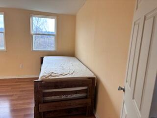 4100 Howard Street Hobart, IN 46342 - Photo 22 of 36 a bedroom with a bed and a window