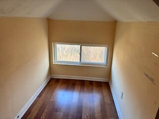 4100 Howard Street Hobart, IN 46342 - Photo 24 of 36 an empty room with wooden floor and windows