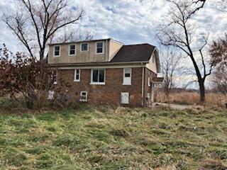 4100 Howard Street Hobart, IN 46342 - Photo 33 of 36 a house that has a tree in front of it