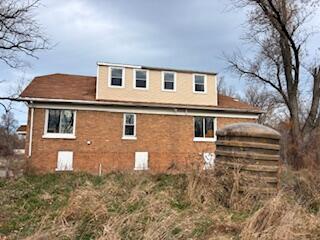 4100 Howard Street Hobart, IN 46342 - Photo 34 of 36 a front view of a house with garden