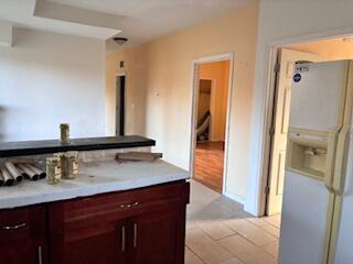 4100 Howard Street Hobart, IN 46342 - Photo 7 of 36 a bathroom with a sink and a mirror