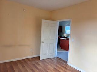 4100 Howard Street Hobart, IN 46342 - Photo 10 of 36 a view of hallway with wooden floor