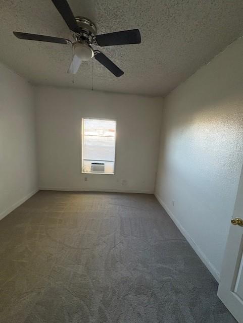 709 Grape Street, Unit B Abilene, TX 79601 - Photo 7 of 8 an empty room with a window and a ceiling fan