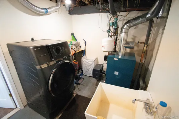 a utility room with dryer and washer