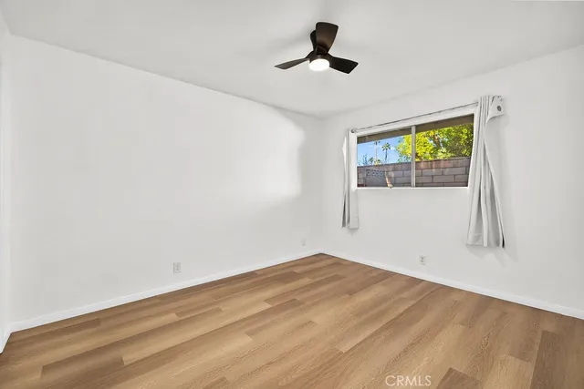 a bathroom with a shower toilet and sink