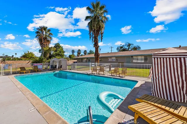 a view of swimming pool with a patio