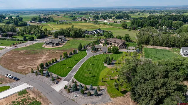 an aerial view of a house with outdoor space