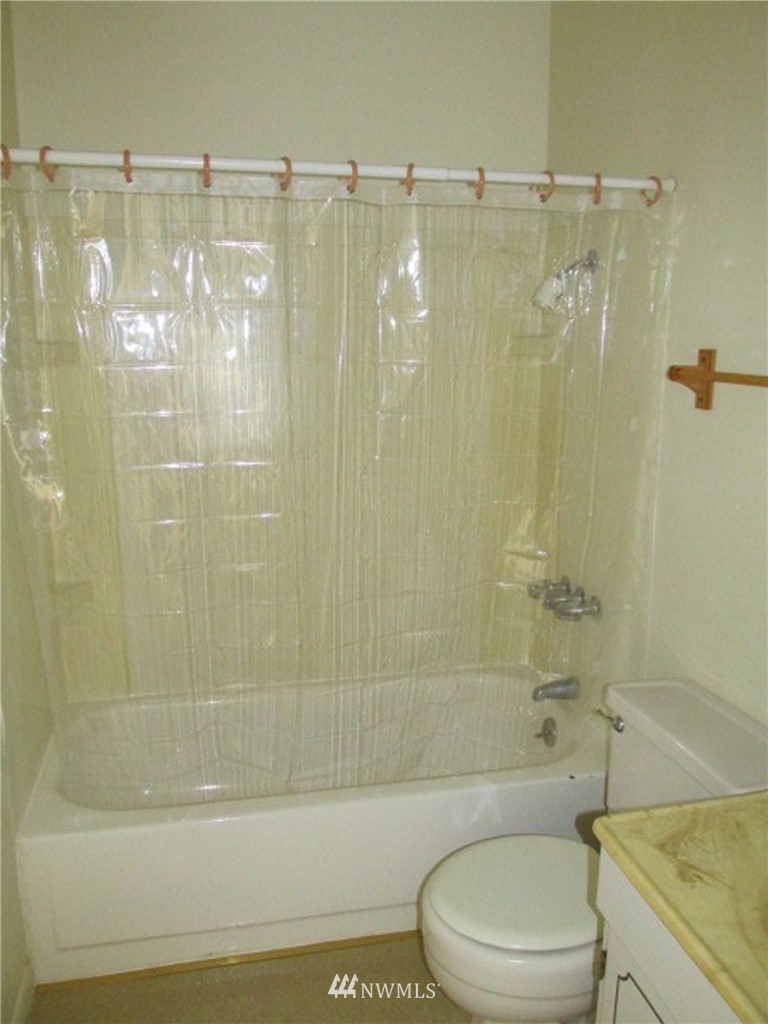 1020 J Street Hoquiam, WA 98550 - Photo 18 of 24 a view of a bathroom with a shower