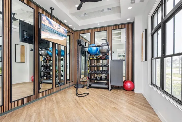 a view of an entryway with wooden floor