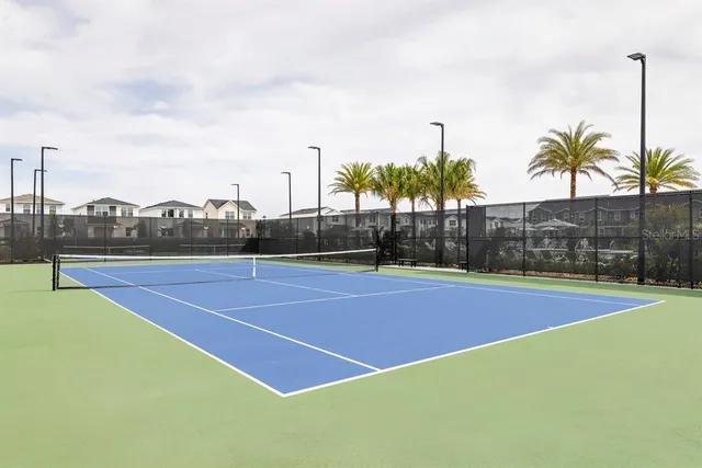 a tennis court that has tennis net