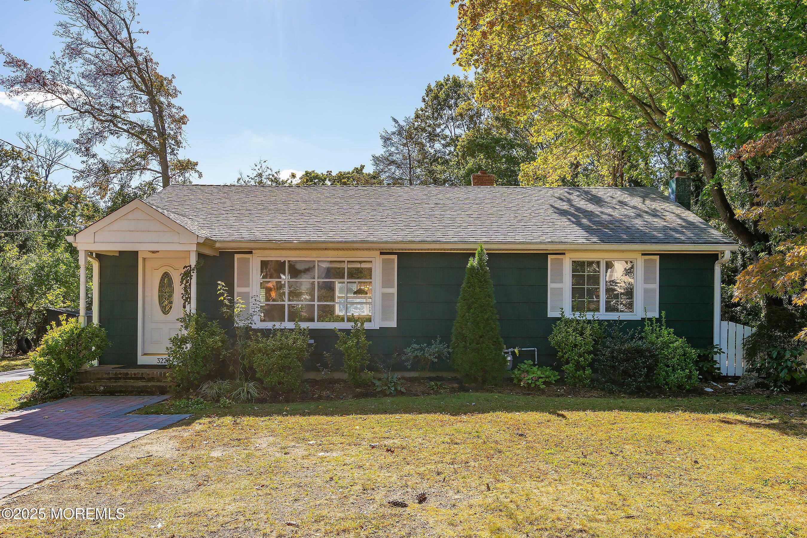 3228 Allaire Road Allenwood, NJ 07719 - Photo 1 of 40 a front view of a house with a yard