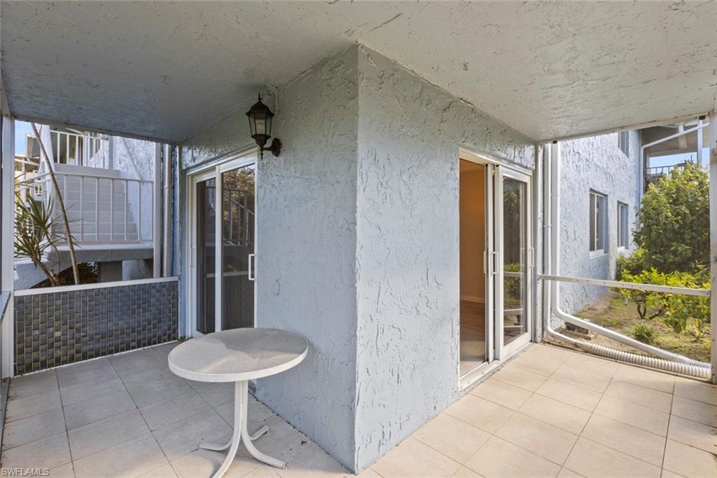 248 Palm Drive, Unit 5 Naples, FL 34112 - Photo 19 of 37 a view of kitchen with furniture and refrigerator