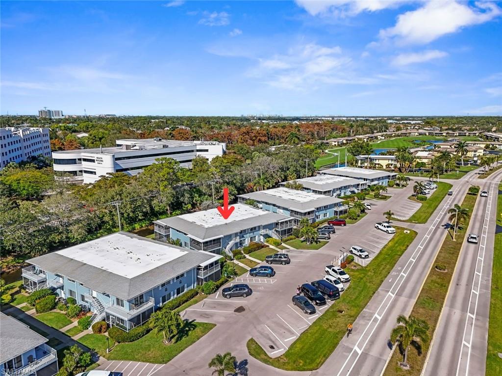 248 Palm Drive, Unit 5 Naples, FL 34112 - Photo 23 of 37 an aerial view of a city