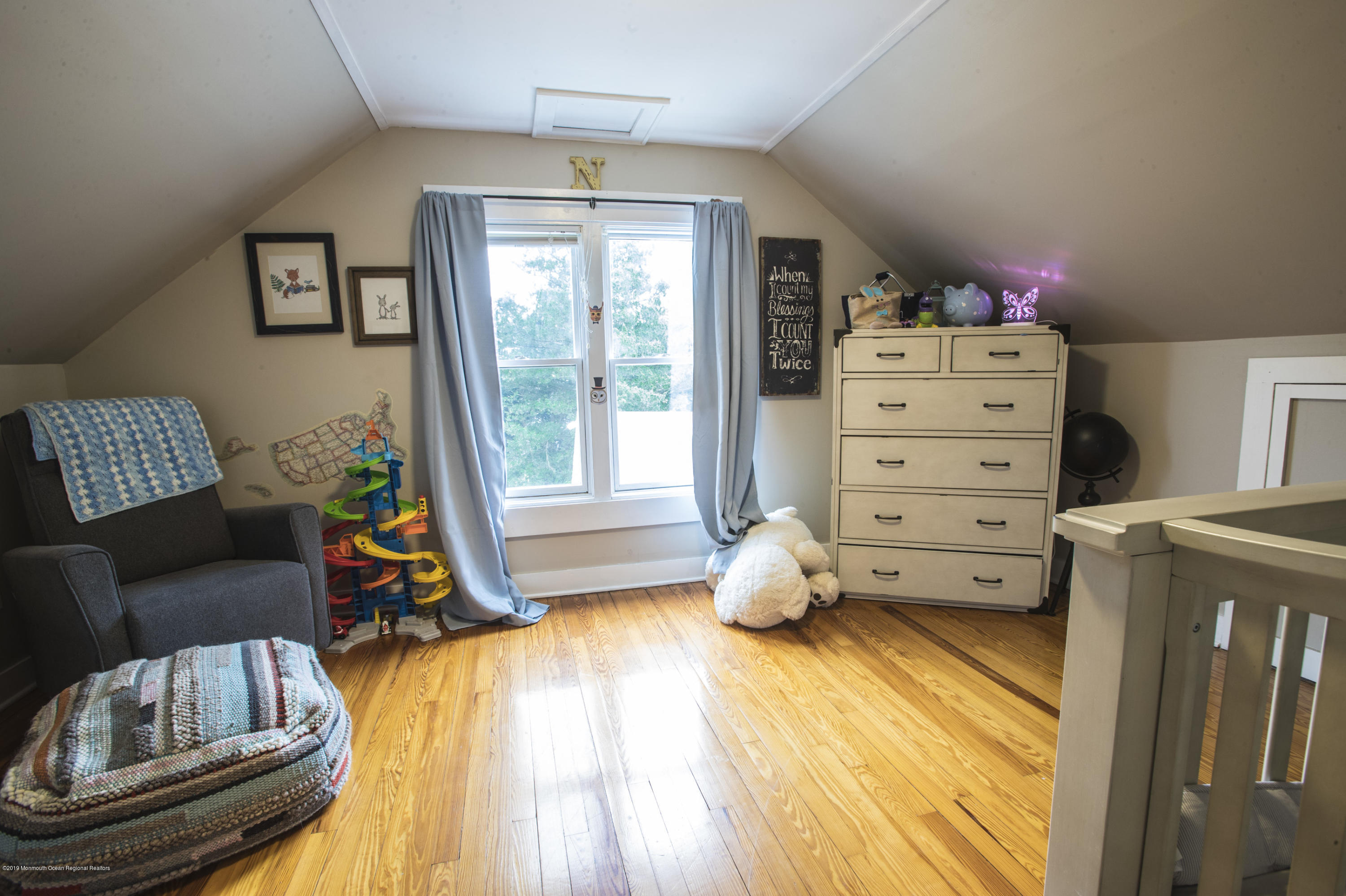 204 Leesville Road Jackson, NJ 08527 - Photo 15 of 49 a bedroom with a bed and wooden floor