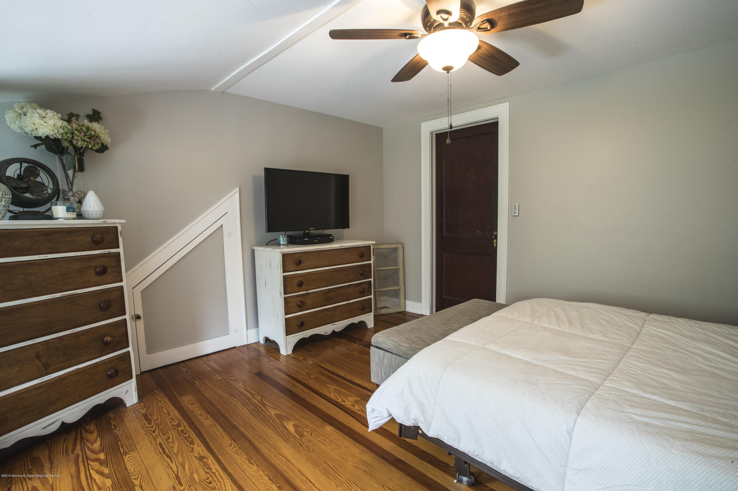 204 Leesville Road Jackson, NJ 08527 - Photo 17 of 49 a bedroom with a bed and a flat screen tv