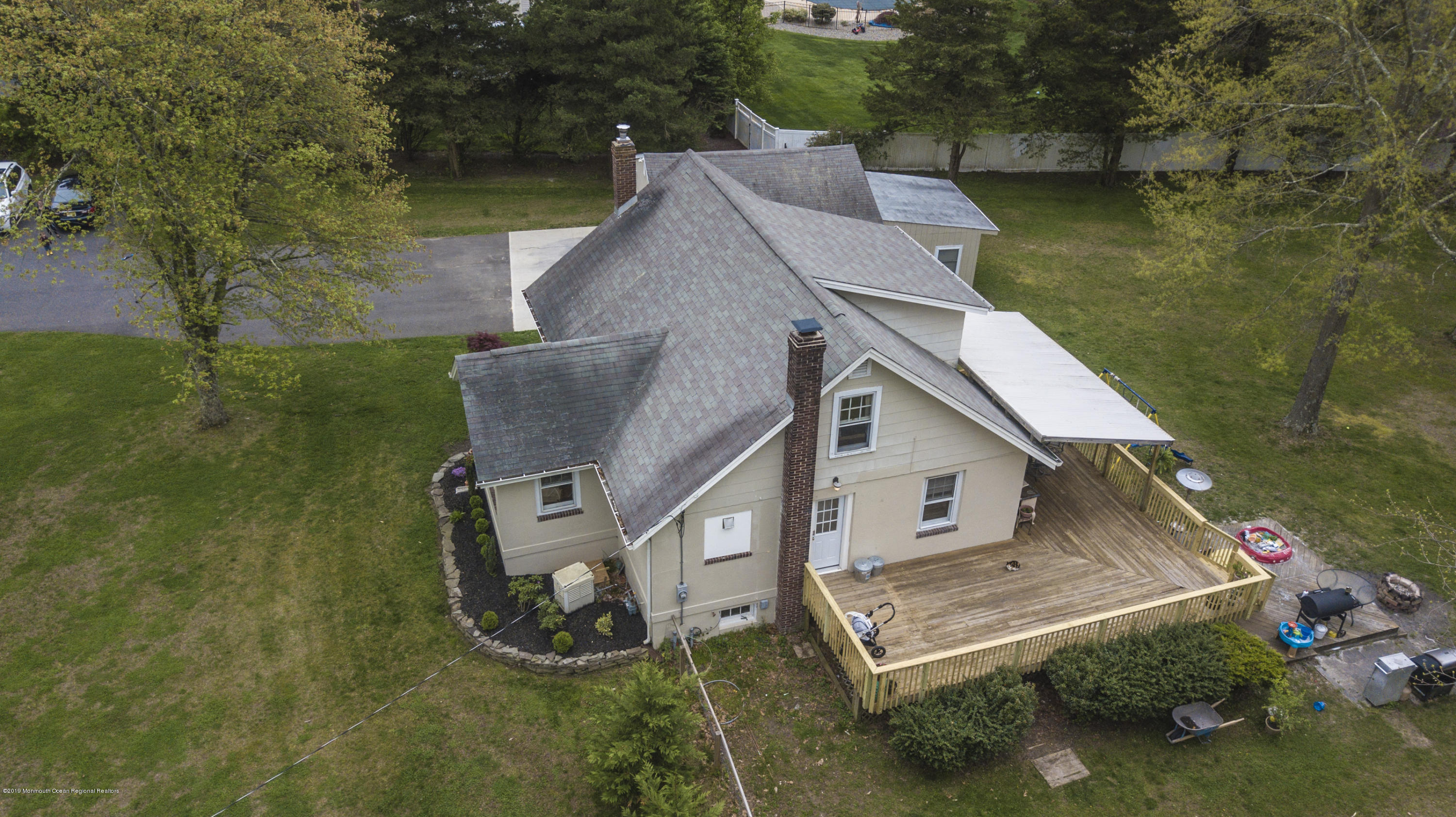 204 Leesville Road Jackson, NJ 08527 - Photo 41 of 49 an aerial view of a house with outdoor space and a lake view in back