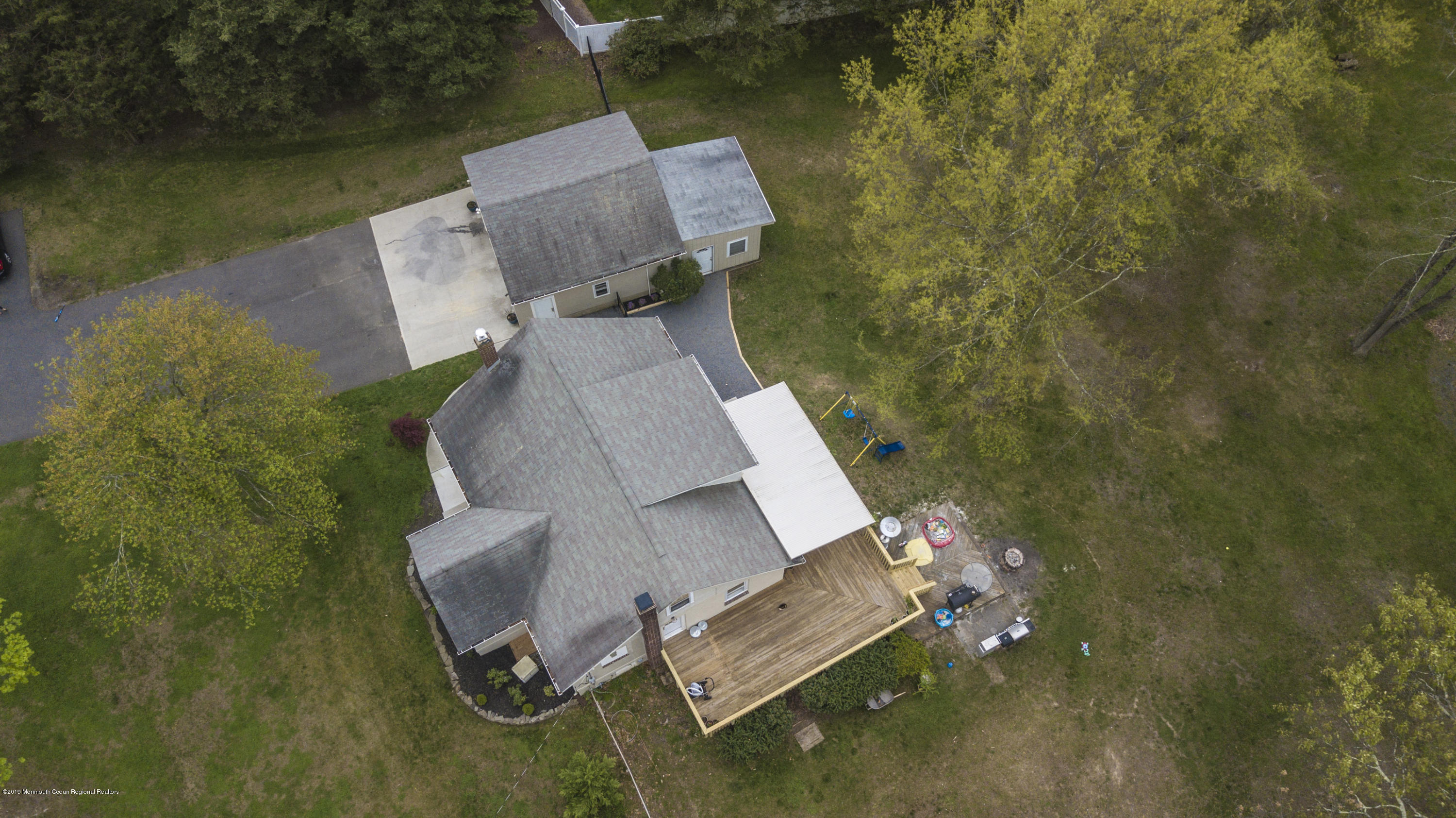 204 Leesville Road Jackson, NJ 08527 - Photo 42 of 49 an aerial view of a house with a garden and lake view