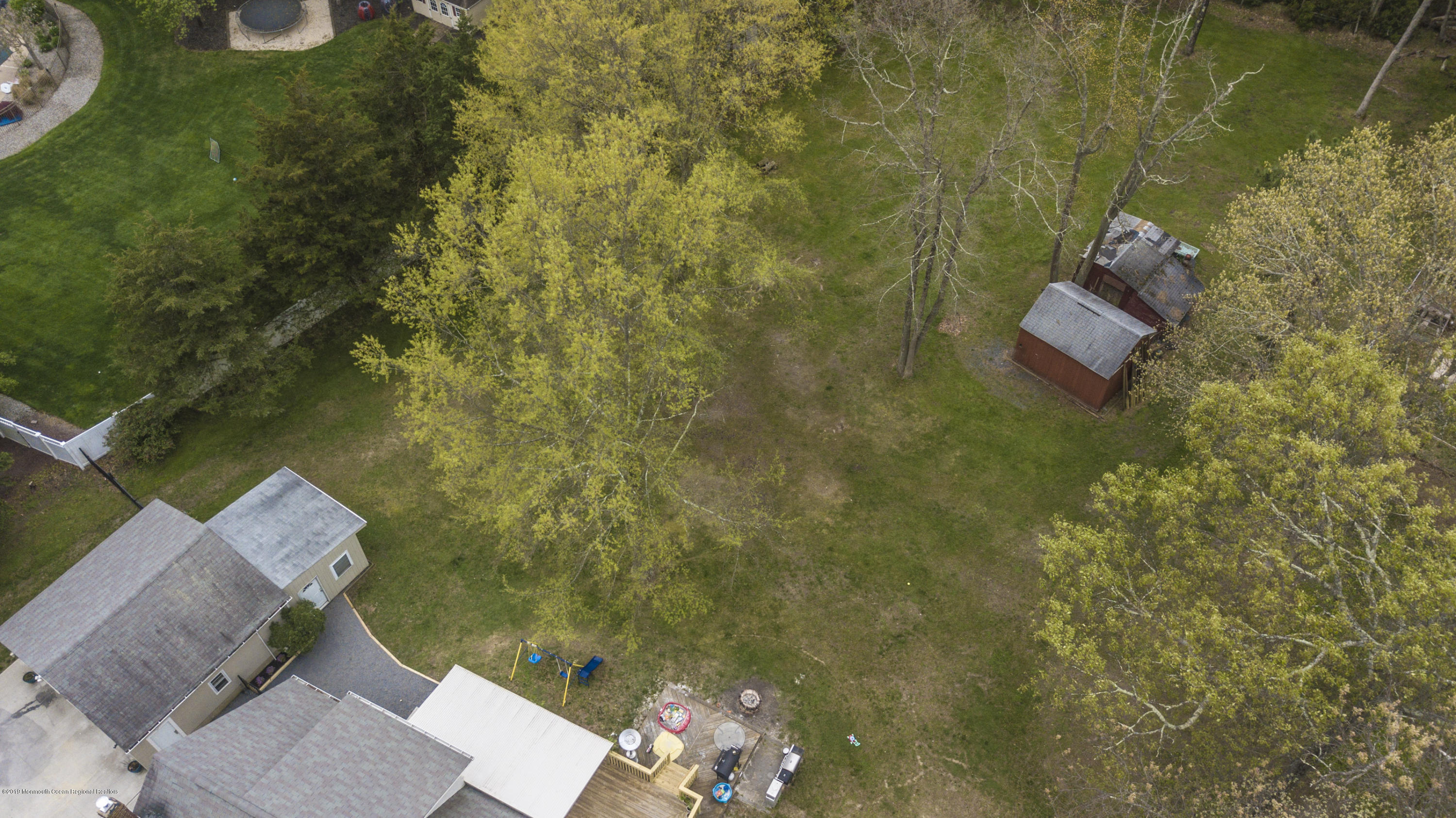 204 Leesville Road Jackson, NJ 08527 - Photo 43 of 49 an aerial view of a house with a yard