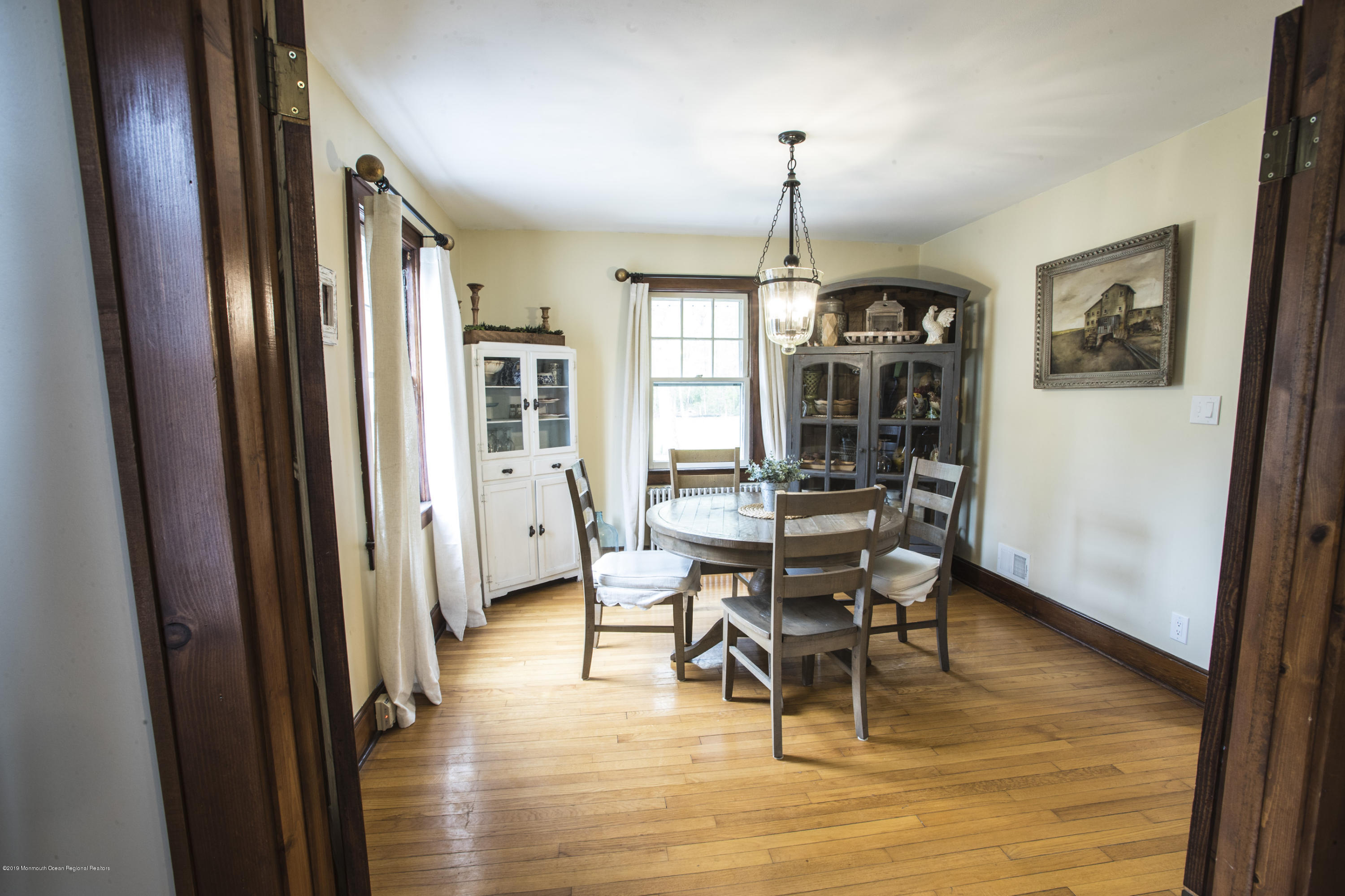 204 Leesville Road Jackson, NJ 08527 - Photo 7 of 49 a view of a dining room with furniture window and wooden floor