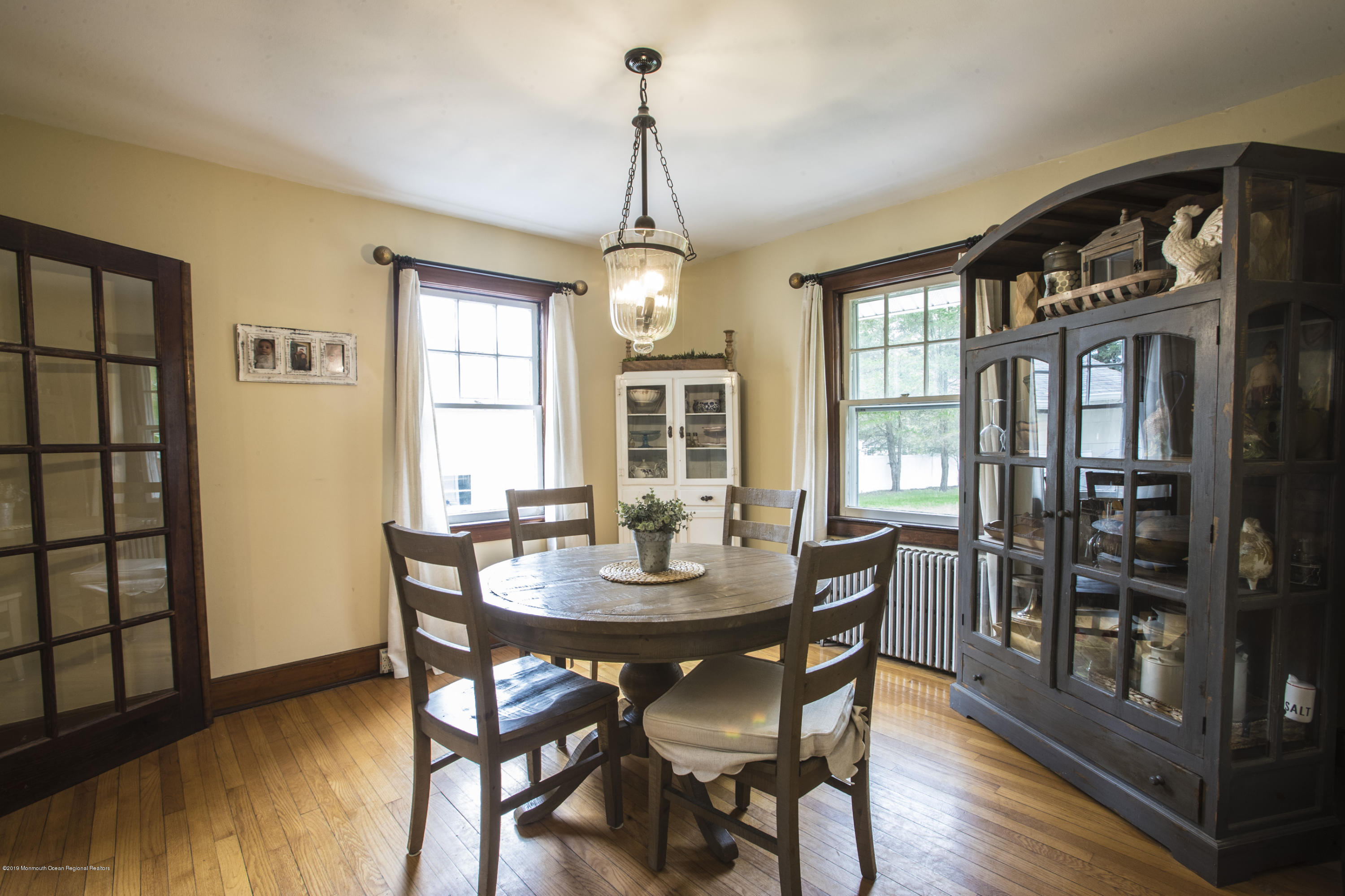 204 Leesville Road Jackson, NJ 08527 - Photo 8 of 49 a dining room with furniture window and wooden floor