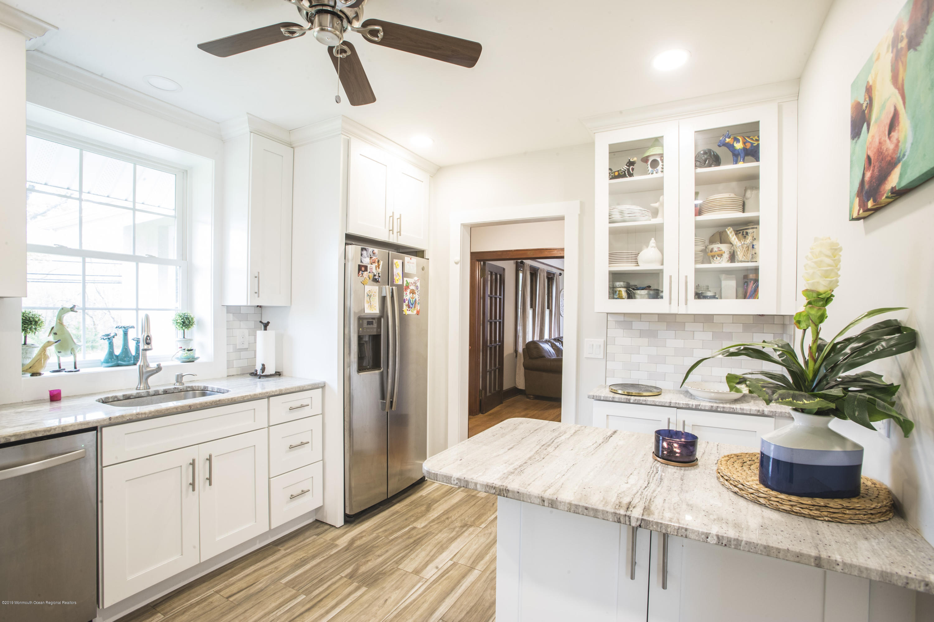 204 Leesville Road Jackson, NJ 08527 - Photo 10 of 49 a kitchen with a refrigerator and sink