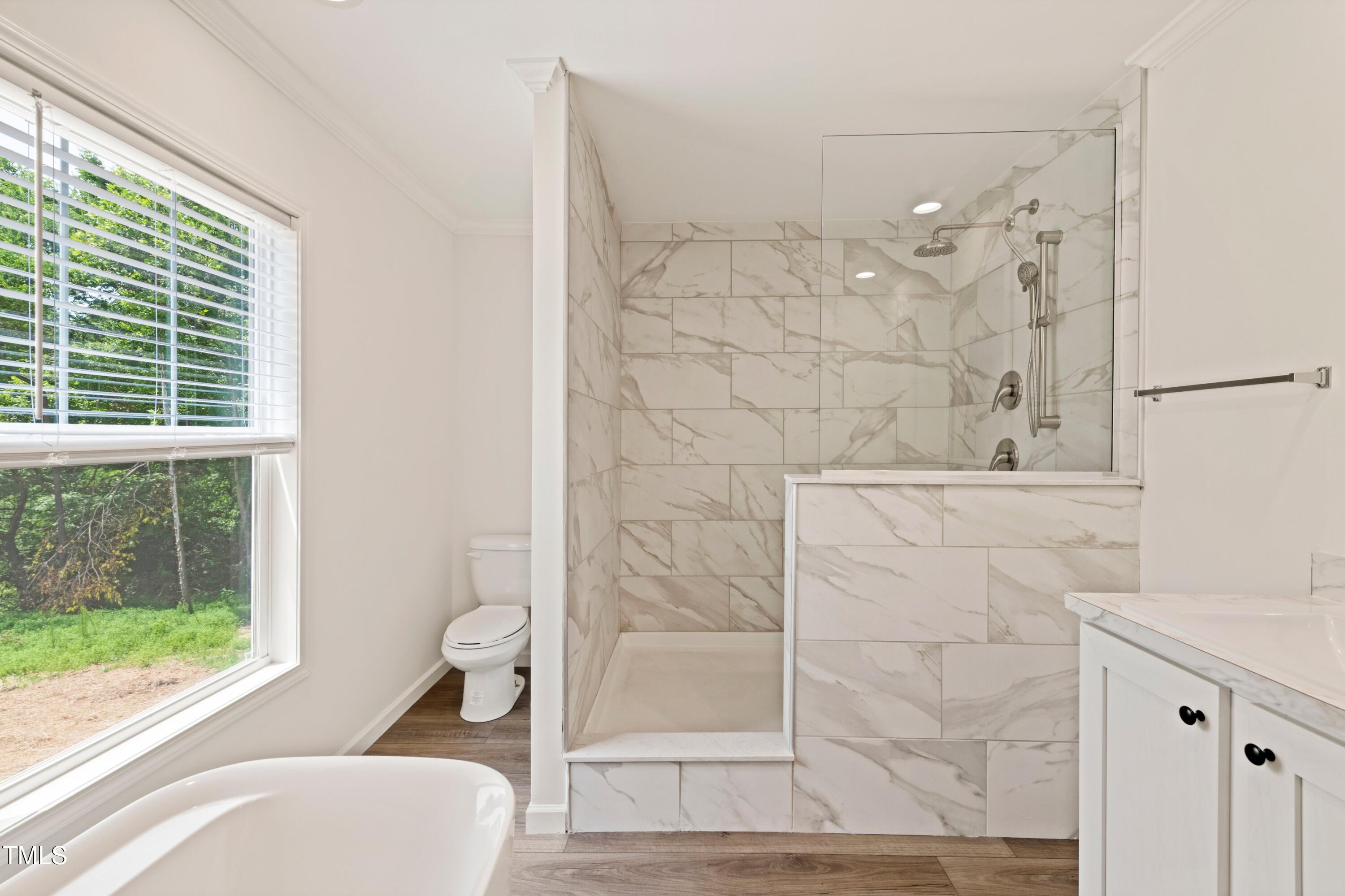 985 John Oakley Road Prospect Hill, NC 27314 - Photo 14 of 23 a bathroom with a bathtub and a shower