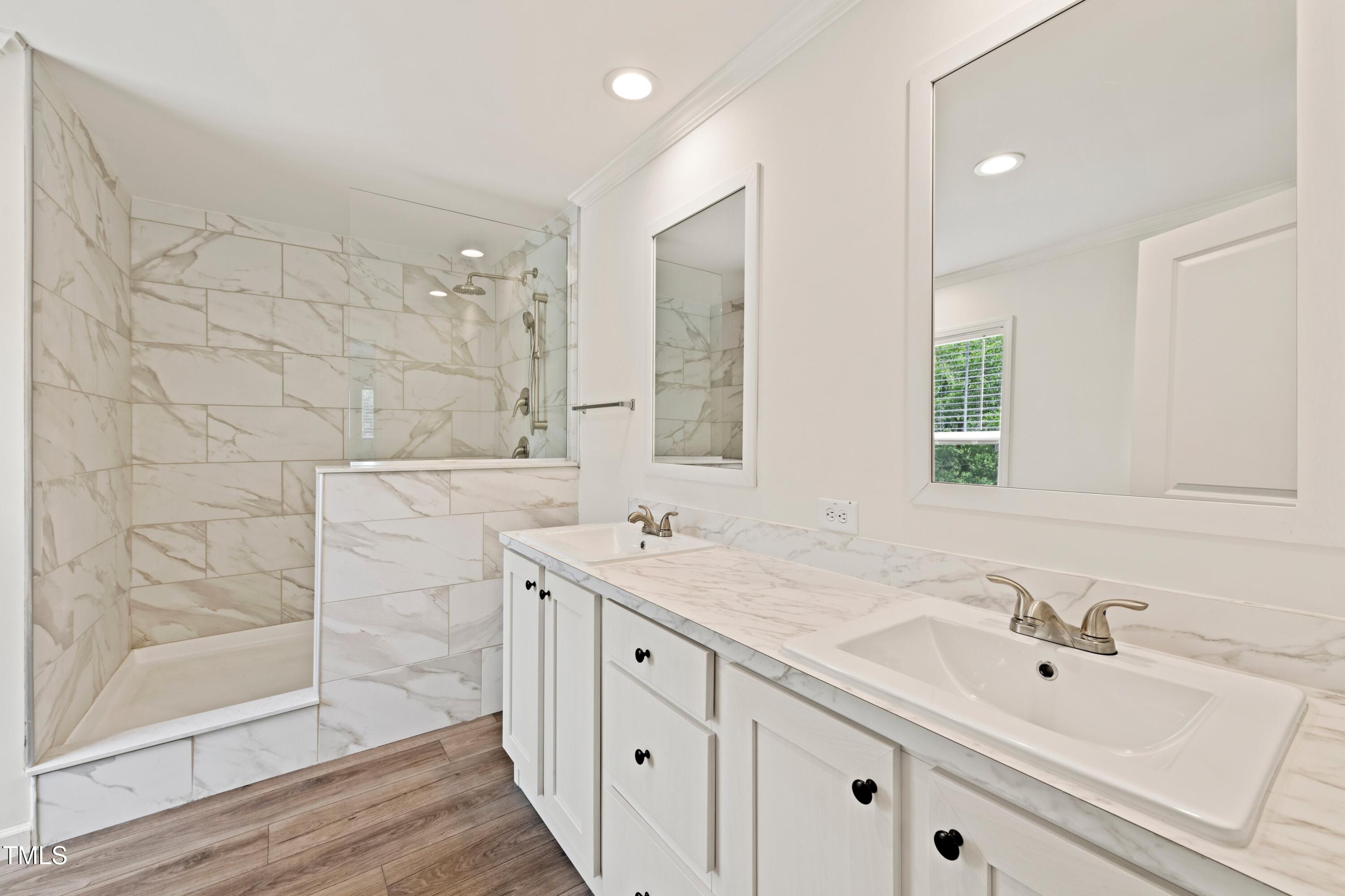 985 John Oakley Road Prospect Hill, NC 27314 - Photo 15 of 23 a bathroom with double sink and a mirror