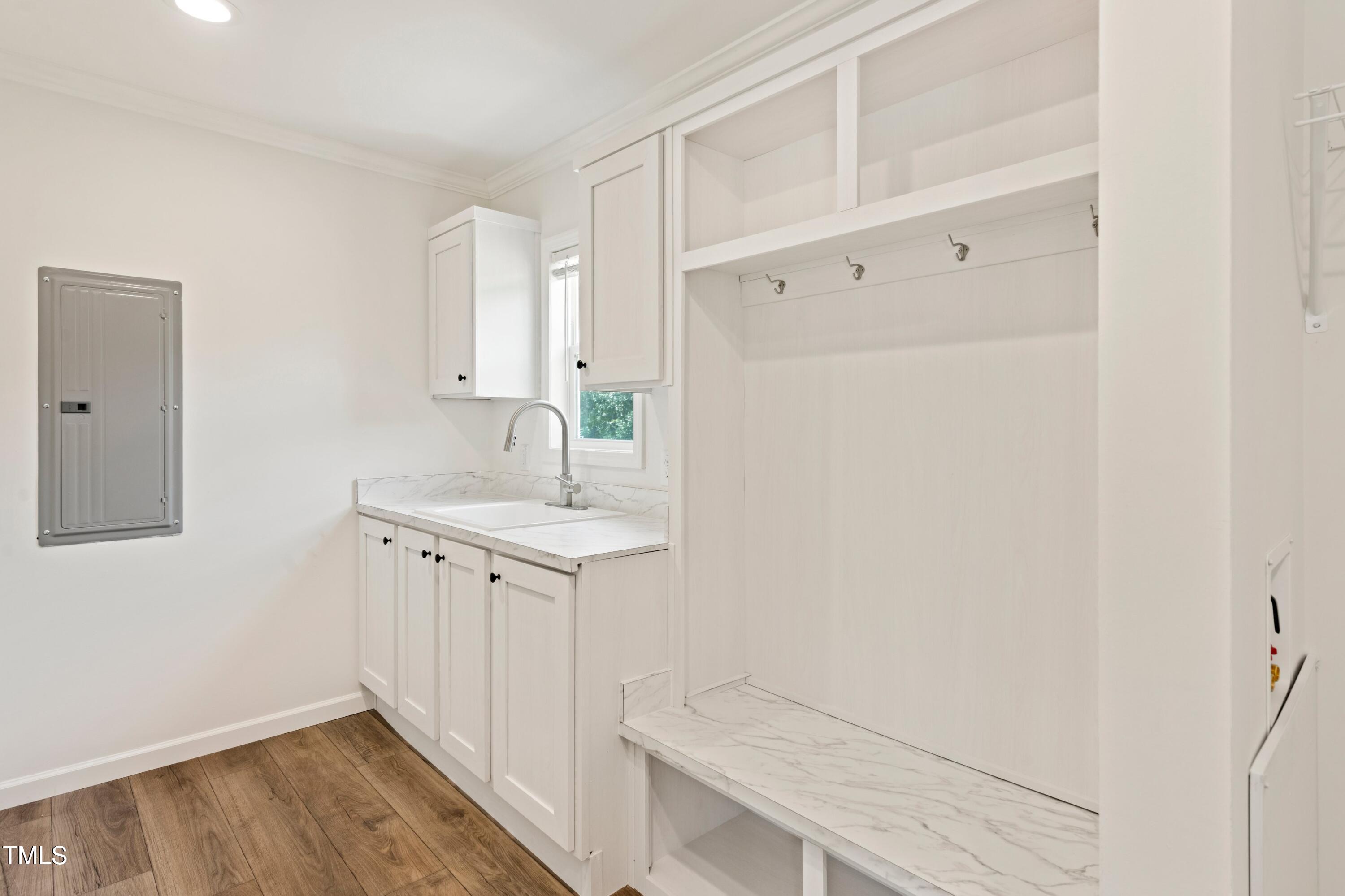 985 John Oakley Road Prospect Hill, NC 27314 - Photo 21 of 23 a bathroom with a sink and a mirror