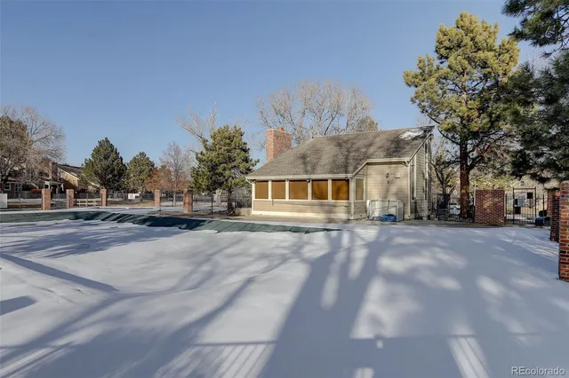 a front view of house with yard outdoor seating and barbeque oven