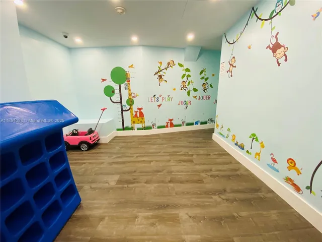 a view of a workspace with furniture and toys